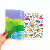 Colorful children's book open to a page with cartoon characters and illustrations.