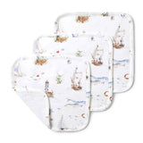 Set of three baby burp cloths with nautical pattern on a white background