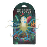 Glow-in-the-dark octopus toy with colorful packaging on a white background