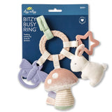 Baby teething ring with various textures and shapes on a blue packaging background