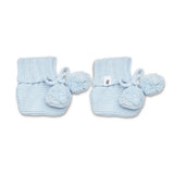 Pair of light blue baby booties with pom-poms on a white background