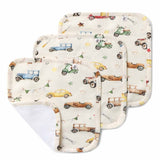 Three baby wipes with car pattern on a white background