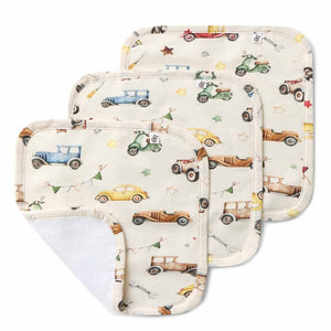 Three baby wipes with car pattern on a white background