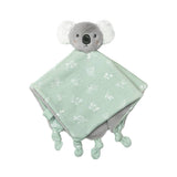 Plush toy with a green blanket featuring white patterns on a white background