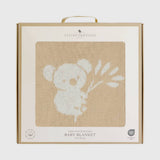 Living Textiles baby blanket packaging with a koala design on a beige background