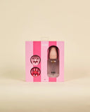 BIBS baby bottle and pacifier set in its pink packaging box, featuring a clear bottle with a pink cap and two pacifiers with bear faces, set against a solid beige background.