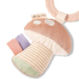 Mushroom-shaped teething ring with colorful textures on a white background