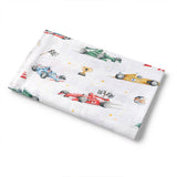 Folded fabric with race car pattern on a white background
