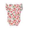 Baby onesie with strawberry pattern on a white background