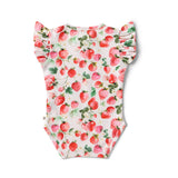 Baby onesie with strawberry pattern on a white background