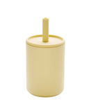 Yellow tumbler with a straw on a white background
