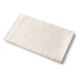 Fabric swatch with small yellow stars on a white background