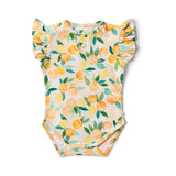 Baby onesie with lemon pattern on a white background