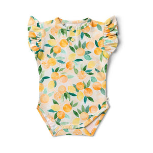Baby onesie with lemon pattern on a white background