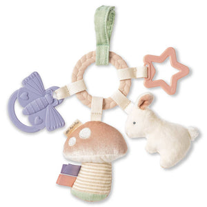 Baby toy with various shapes and textures on a white background
