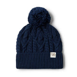 Blue knit beanie with pom-pom on a white background