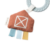 Textured teething ring with colorful ribbons on a white background
