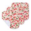 Set of four strawberry-patterned oven mitts on a white background