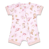 A baby short-sleeve romper in light pink with a western-themed print featuring cowboy boots, pink hats, bows, flowers, and horseshoes, finished with a front zipper and ribbed trim.