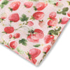 Fabric with strawberry pattern on a white background