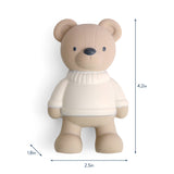 Beige teddy bear with a white sweater and measurements on a white background
