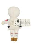 Small plush toy with a white outfit and brown boots on a white background