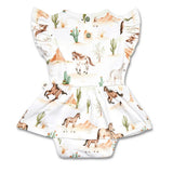 A white baby romper with a western desert print featuring horses, cacti, and mountains, complete with ruffled sleeves and snap closures at the neckline.