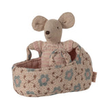 A Le Le play fabric mouse toy sitting inside its floral-patterned fabric carrier basket, photographed on a clean white background.