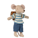 A small plush mouse doll with beige fur, wearing a blue and cream striped knit shirt, blue shorts, and carrying a brown backpack, photographed on a plain white background.