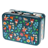 A rectangular metal lunchbox with a dark teal background and a colorful whimsical print of fairies, flowers, and butterflies. The box features a matching teal handle and silver metal latches on the front.