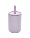 Purple tumbler with a straw on a white background