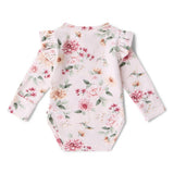 Floral-patterned baby onesie on a white background