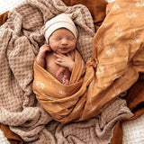 Snuggle Hunny Bronze Palm Organic Muslin Wrap | Organic Cotton Baby Swaddle