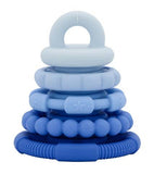 A set of five silicone baby teething rings stacked in a pyramid, featuring different textures and colors ranging from pale icy blue to royal blue, on a solid white background.