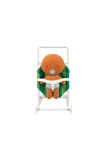 Plush toy with a pacifier sitting in a baby bouncer on a white background