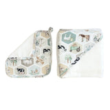 A set of baby blankets and a matching muslin cloth featuring a farm-themed honeycomb pattern with illustrations of cows, horses, ducks, a tractor, and farm animals on a white background.