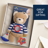 Teddy bear with striped shirt and accessories in a box, labeled 'Great for Gifting'.