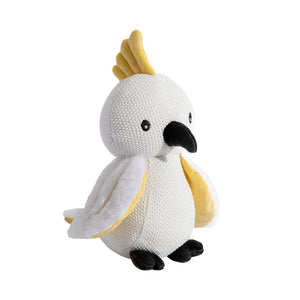 Knitted parrot toy with white body, yellow crest, and black feet on a white background