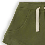 Green ribbed shorts with a drawstring on a white background