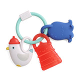 Colorful baby teething toy with chicken design on a white background