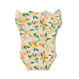 Children's onesie with lemon pattern on a white background