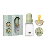 BIBS baby bottle and pacifier set with packaging on a white background