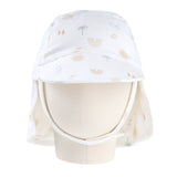 Bucket hat with a palm tree and rainbow pattern on a mannequin head against a white background