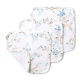Set of floral-patterned pot holders on a white background
