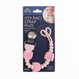 Pink pacifier clip with bows on a blue packaging background