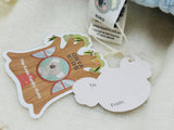 Children's gift tag with cartoon koala design and 'Onya Kids' branding on a textured surface.