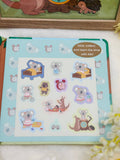 Children's book with sticker activity on a wooden surface