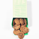 Box of cookies with a green label on a white background