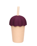 Purple ice cream cone with a wooden stick on a white background