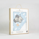 Baby hooded towel with elephant design in packaging on a light gray background